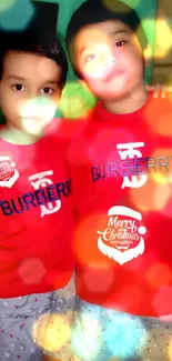 Festive kids in red shirts with bokeh lights.