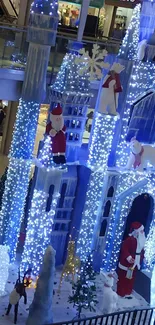 Festive blue castle with Santa and lights.