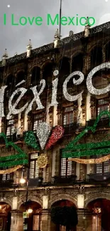 Vibrantly decorated historic Mexican building with festive lights at night.