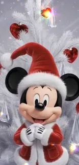 Mickey Mouse in Santa outfit with white Christmas tree.