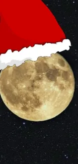 Moon wearing a Santa hat in a starry night sky.