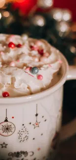 Festive mug with whipped cream and colorful sprinkles.