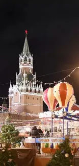 Festive night view of Red Square with colorful lights and balloons.