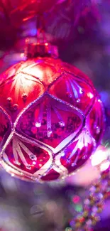 Colorful Christmas ornament with red and purple hues enhances festive holiday spirit.