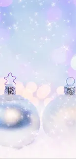 Festive ornaments with sparkling lights on a pastel blue background.