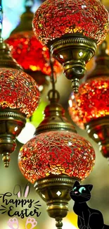 Red ornate lanterns with black cat and Happy Easter message.