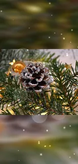 Frosted pine cone with gold lights and green branches.