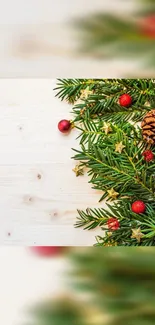 Holiday-themed wallpaper with pine cones and evergreen on a wooden surface.