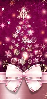 Festive pink Christmas tree wallpaper with snowflakes and ribbon bow.