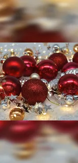 Festive red and gold Christmas ornaments with twinkling lights.