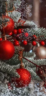 Festive Christmas tree with red ornaments and snowy effect.