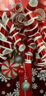 Red festive gift wrap with ribbons and ornaments.