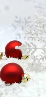 Mobile wallpaper with red ornaments and snowflakes.