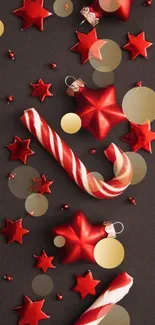 Festive mobile wallpaper with red stars and candy canes.