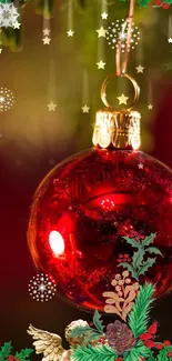 Red Christmas ornament with holly and snowflakes on a festive wallpaper.