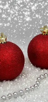 Festive red Christmas ornaments with sparkles.