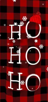 Festive red plaid wallpaper with 'Ho Ho Ho' and snowflakes.