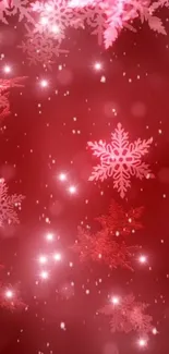 Red festive wallpaper with snowflakes and sparkles.