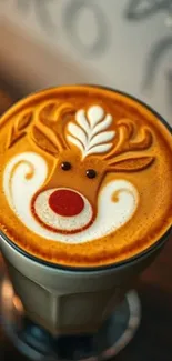 Latte with festive reindeer coffee art design.