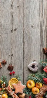 Festive rustic wallpaper with wood, pine, and holiday decor.