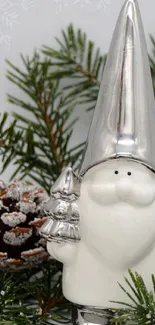 Cute winter gnome with silver accents and frosted pine branches.