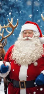 Santa Claus with reindeer in snow wallpaper.