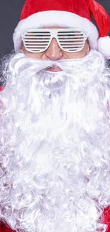 Santa Claus wearing a red suit, white beard, and fun sunglasses.