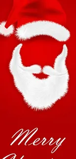 Santa Claus hat and beard on red background with Merry Christmas text.