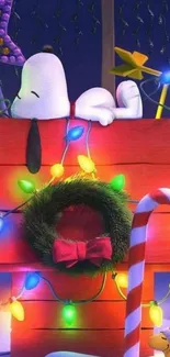 Snoopy lying on a decorated doghouse with colorful Christmas lights.