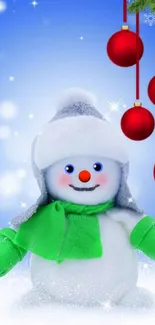 Snowman with green scarf and red ornaments against blue background.