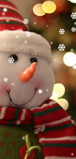 Festive snowman with striped hat and bokeh lights.