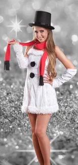 Woman dressed as a snowman with a red scarf on a festive background.