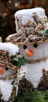 Festive snowman with pinecones and green foliage on a mobile wallpaper background.