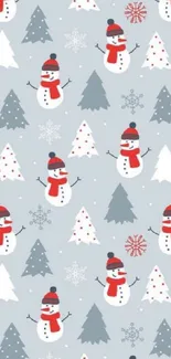 Festive snowmen and trees on blue wallpaper.