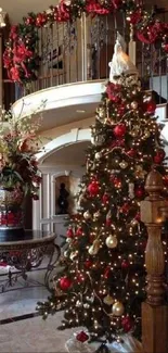 Elegant Christmas tree on a grand staircase with festive decorations.