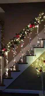 Festive holiday staircase adorned with lights and garland.