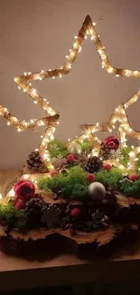 Festive table display with star lights and red baubles.