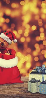 Teddy bear in Santa hat with gifts and golden lights.