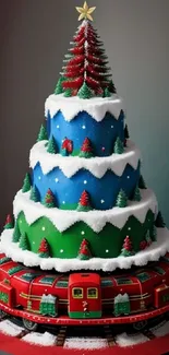 Christmas cake with train tracks and snowy decorations.