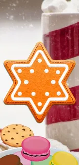 Orange star cookie with festive sweets and candy cane in background.