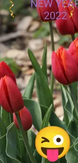 Red tulips with emoji for New Year 2022 celebration.