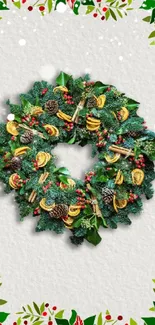 Festive wreath wallpaper with red and green accents on a white background.