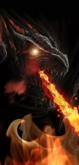 Fierce dragon breathing fire with dark background and bright flames.
