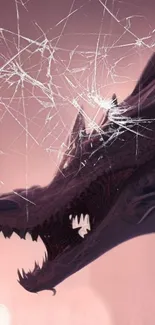 Dragon silhouette with cracked screen and pink hues.