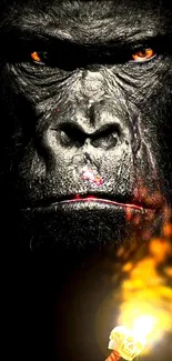 Intense gorilla face with fiery eyes, holding a flaming torch in darkness.