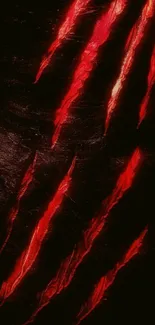 Striking red claw marks on dark background wallpaper.