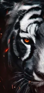 Fierce tiger with orange eyes and black stripes on a dark background wallpaper.