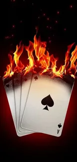 Mobile wallpaper featuring burning playing cards with a black background.