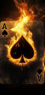 Ace of Spades card engulfed in flames on a black background.