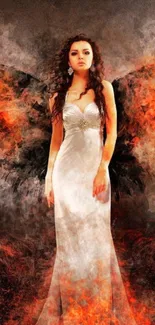 Fantasy angel with fiery wings and a white gown in a dark, mystical setting.